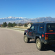 The Jeep Cherokee sits in Colorado Springs, wondering if it can handle the steep mountain passes.